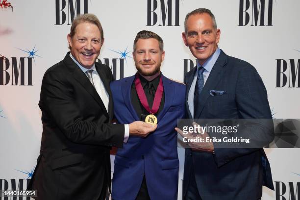 Vice President Creative Clay Bradley, Rob Williford and BMI President and CEO Mike O'Neill attend the 2022 BMI Country Awards at BMI on November 08,...