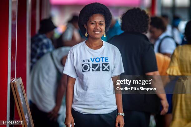 Fijian Election Staff wearing t-shirts showing people how to vote on election day on November 9, 2022 in Suva, Fiji. Fiji's general election will be...