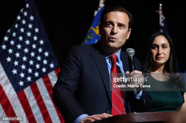 Nevada Republican Senate nominee Adam Laxalt speaks as his wife Jaime looks on at a Republican midterm election night party at Red Rock Casino on...
