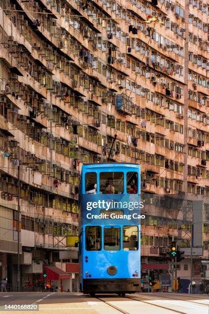 hong kong cityscape,  traditional transportation - straßenbahnstrecke stock-fotos und bilder