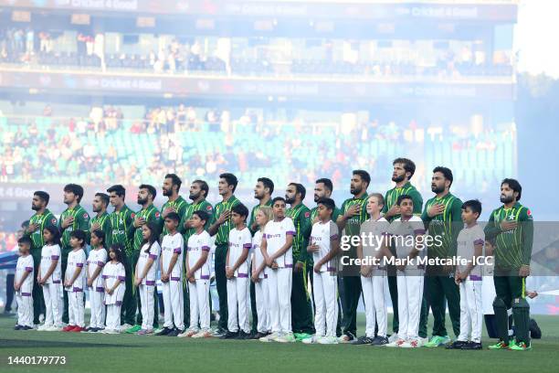 Team Pakistan stand and sing the national anthem during the ICC Men's T20 World Cup Semi Final match between New Zealand and Pakistan at Sydney...