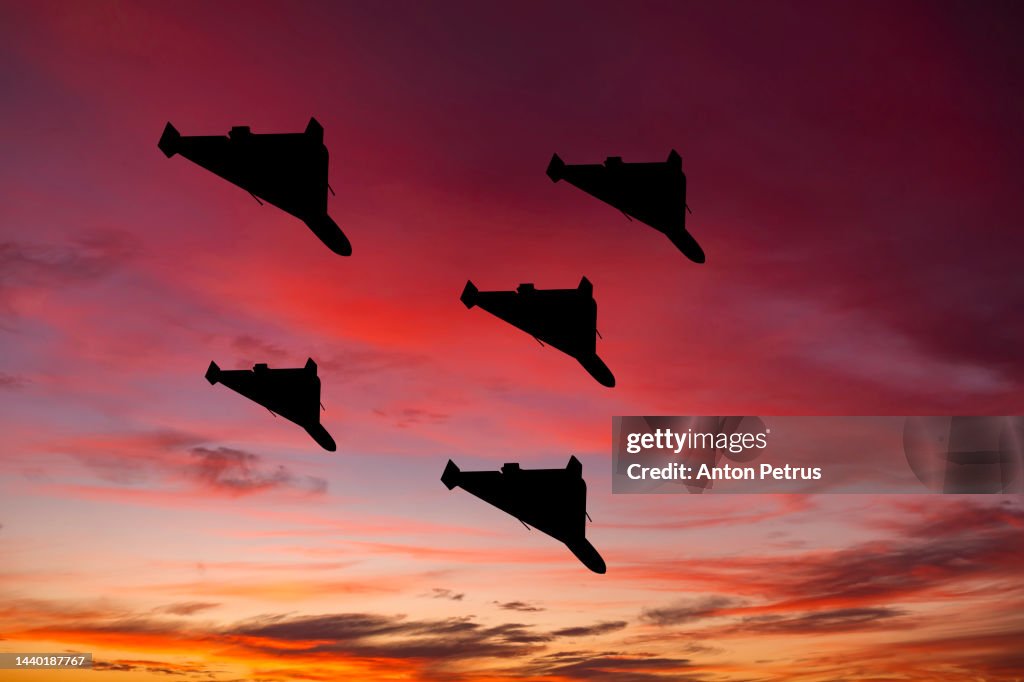 Iranian military unmanned aerial vehicle at sunset. Combat drone