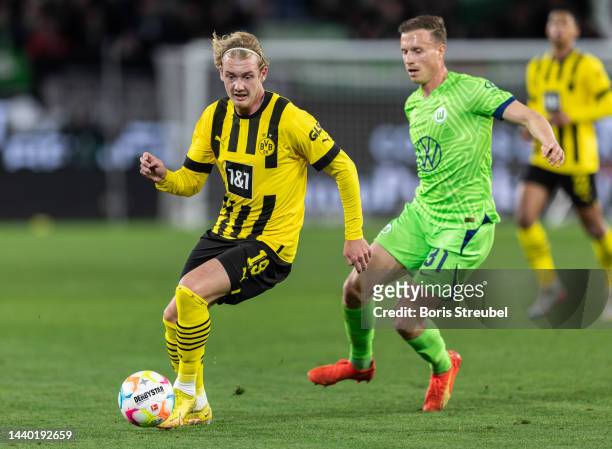 Julian Brandt of Borussia Dortmund runs with the ball during the Bundesliga match between VfL Wolfsburg and Borussia Dortmund at Volkswagen Arena on...