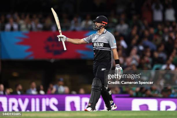 Daryl Mitchell of New Zealand celebrates scoring fifty runs during the ICC Men's T20 World Cup Semi Final match between New Zealand and Pakistan at...
