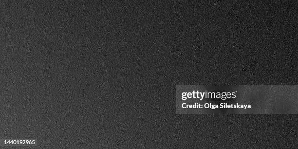 black abstract textured background - black paper texture stockfoto's en -beelden