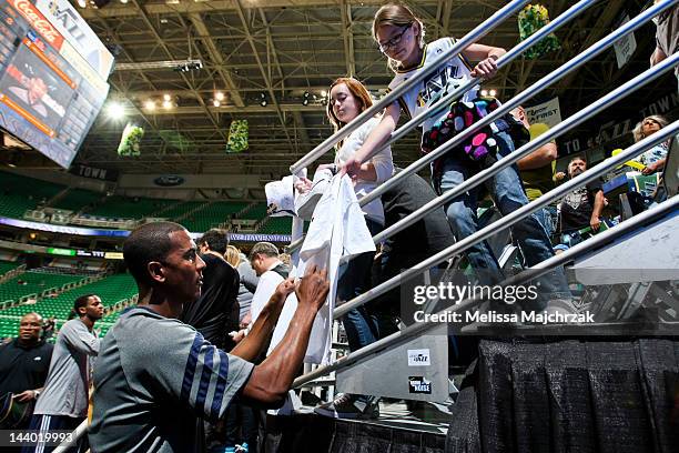 Raja Bell of the Utah Jazz signs autographs for fans before Game Four of the Western Conference Quarterfinals against the San Antonio Spurs during...