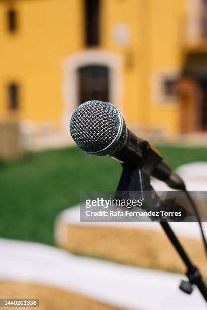 close-up of microphone in wedding ceremony - microphone stand stock pictures, royalty-free photos & images