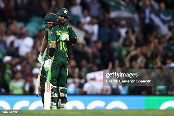 Babar Azam of Pakistan celebrates scoring fifty runs with Mohammad Rizwan of Pakistan during the ICC Men's T20 World Cup Semi Final match between New...