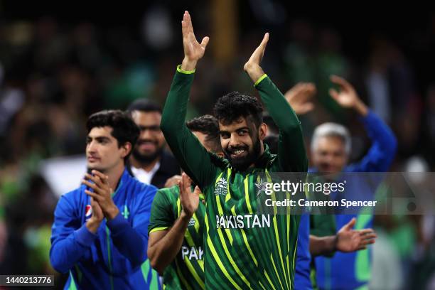 Shadab Khan of Pakistan and team mates thank fans after winning the ICC Men's T20 World Cup Semi Final match between New Zealand and Pakistan at...