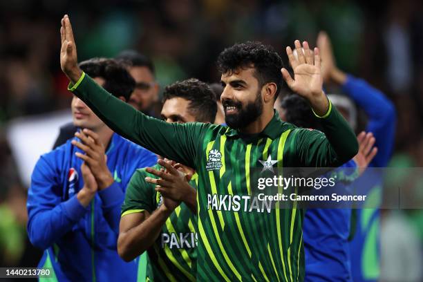 Shadab Khan of Pakistan and team mates thank fans after winning the ICC Men's T20 World Cup Semi Final match between New Zealand and Pakistan at...