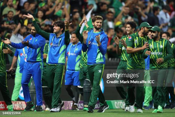 Shaheen Shah Afridi of Pakistan and team mates celebrate winning the ICC Men's T20 World Cup Semi Final match between New Zealand and Pakistan at...