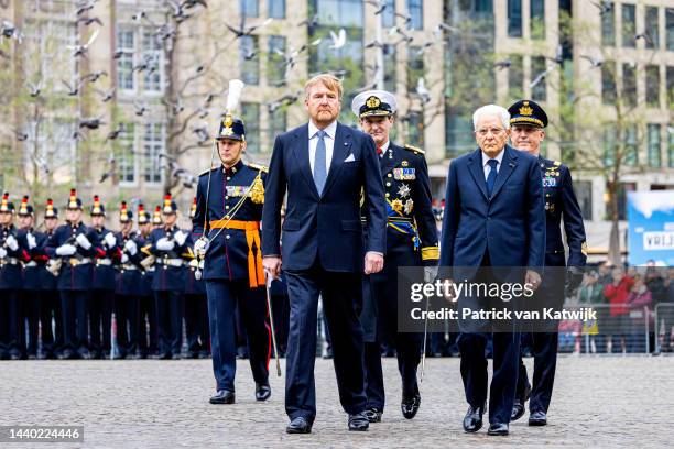 King Willem-Alexander of The Netherlands and President Sergio Mattarella of Italy during an official welcome ceremony at the Dam Square on November...