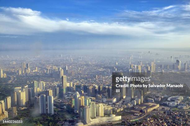 metro manila skyline - early morning - quezon city stock pictures, royalty-free photos & images
