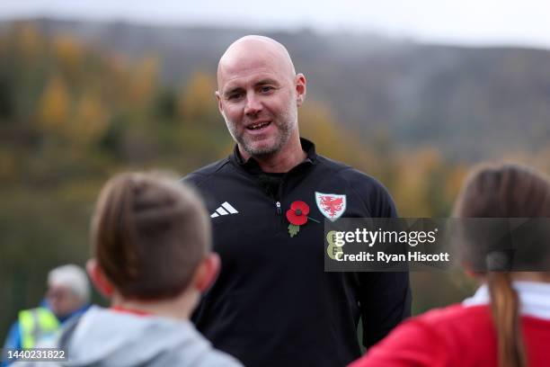Rob Page, Manager of Wales, speaks to school children during the Rhondda Primary Schools Football Festival & 3G Pitch Official Opening on November...