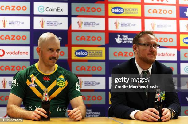 Brad Grove of Australia looks on alongside Brett Clark, Head Coach of Australia following the Wheelchair Rugby League World Cup Group A match between...