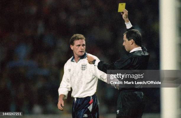 October 1992, Wembley - FIFA World Cup - England v Norway - Paul Gascoigne is shown the yellow card by referee Arturo Brizio Carter.