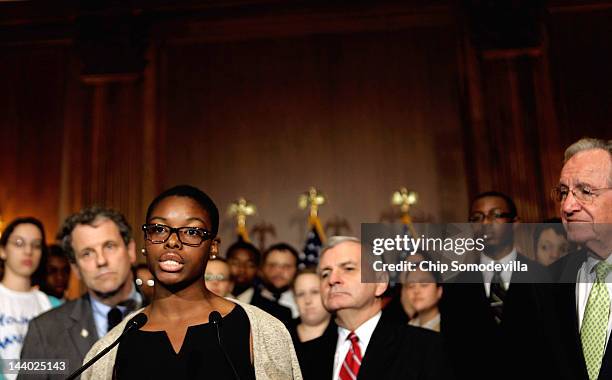 College students from across the country listen as Howard University student Clarise McCants of Philadelphia, PA, speaks about the student loan bill...