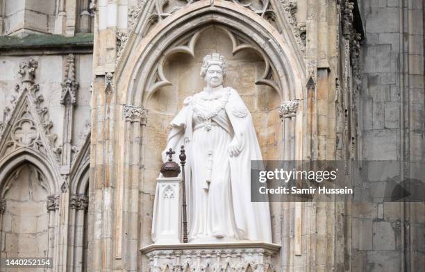 The statue of Queen Elizabeth II is seen at York Minster unveiled by King Charles III and Camilla, Queen Consort during an official visit to...