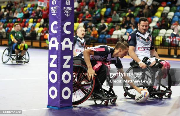 Jack Brown of England goes over for a try during the Wheelchair Rugby League World Cup Group A match between England and Ireland at Copper Box Arena...