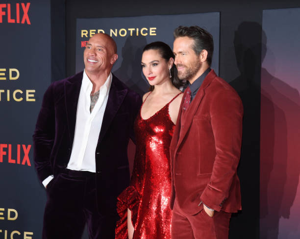 Dwayne Johnson, Gal Gadot and Ryan Reynolds at the world premiere of Netflix's 'Red Notice' at L.A. Live on November 3, 2021 in Los Angeles,...