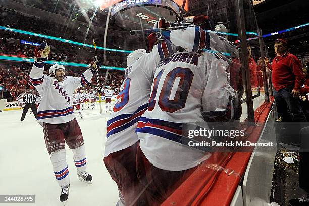 The New York Rangers celebrate after Marian Gaborik scored the game winning goal in the third overtime period against the Washington Capitals in Game...
