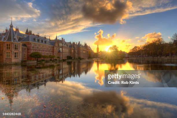 dutch houses of parliament at sunset - the hague bildbanksfoton och bilder