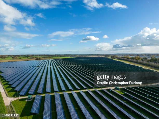 An aerial view of the Shotwick Solar Park on November 09, 2022 in Deeside, Wales. The array of photovoltaic solar panels is spread over 250 acres and...