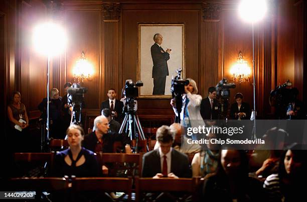 Portrait of former Sen. Mike Mansfield hangs in the room named for him before a news conference with about the student loan bill currently being...