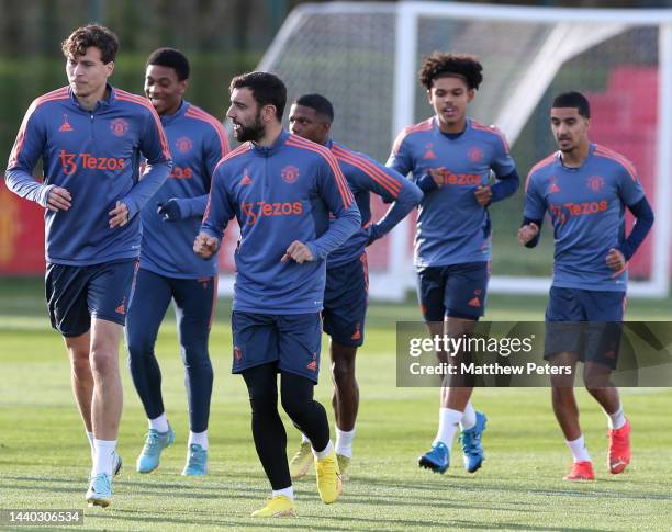 Victor Lindelof, Bruno Fernandes of Manchester United in action during a first team training session at Carrington Training Ground on November 09,...