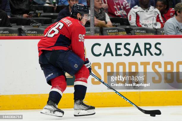 Nicolas Aube-Kubel of the Washington Capitals skates with the puck against the Edmonton Oilers during the thir period at Capital One Arena on...