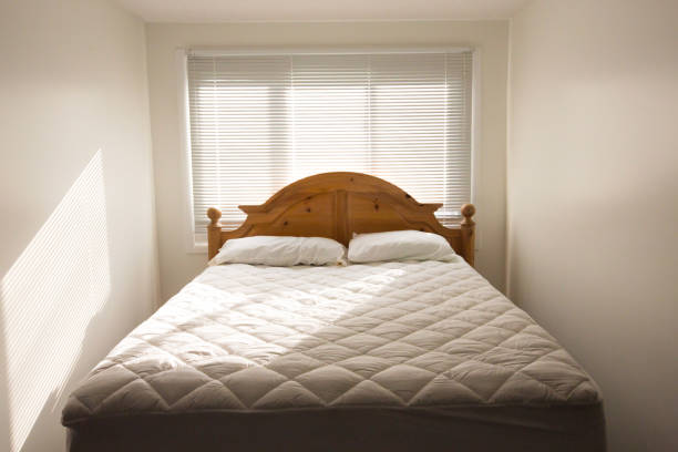 The 10 Best Mattresses in South Africa 1 small bedroom with bare mattress clean bed with clean bedding on laundry day