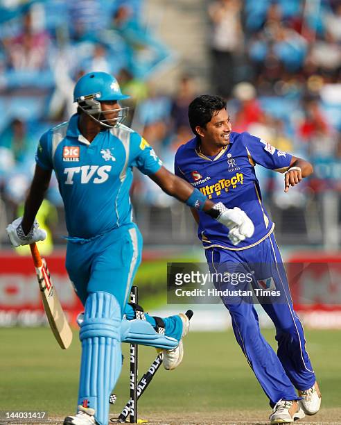 Rajasthan Royals player Siddharth Trivedi celebrates the runout of Pune Warriors player Angelo Mathews during the IPL 5 T20 match between Pune...