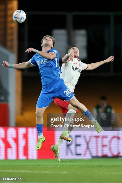 Mirnes Pepic of Meppen and Ron Berlinski of Essen go up for a header during the 3. Liga match between Rot-Weiss Essen and SV Meppen at Stadion an der...
