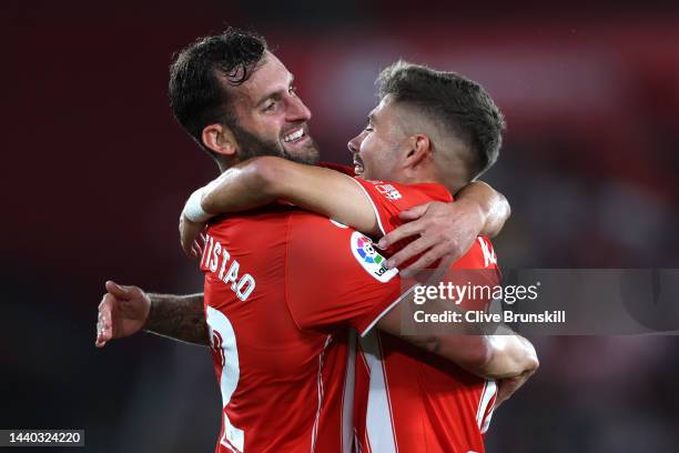 Leo Baptistao of UD Almeria celebrates with teammate Alejandro Pozo after scoring their team's first goal during the LaLiga Santander match between...