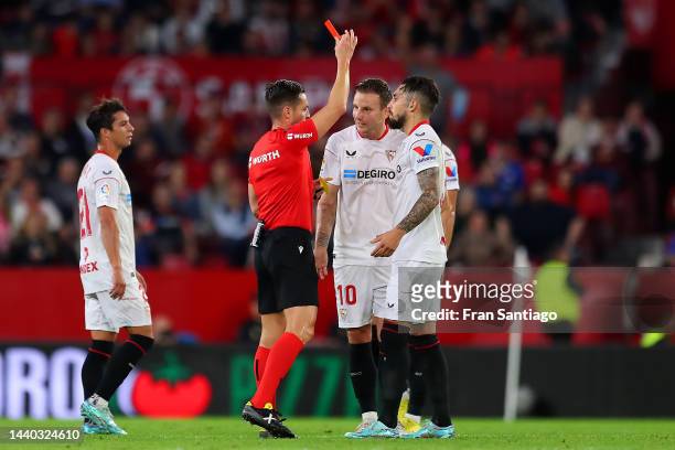 Ivan Rakitic of Sevilla FC is shown a red card by referee Carlos Del Cerro Grande during the LaLiga Santander match between Sevilla FC and Real...