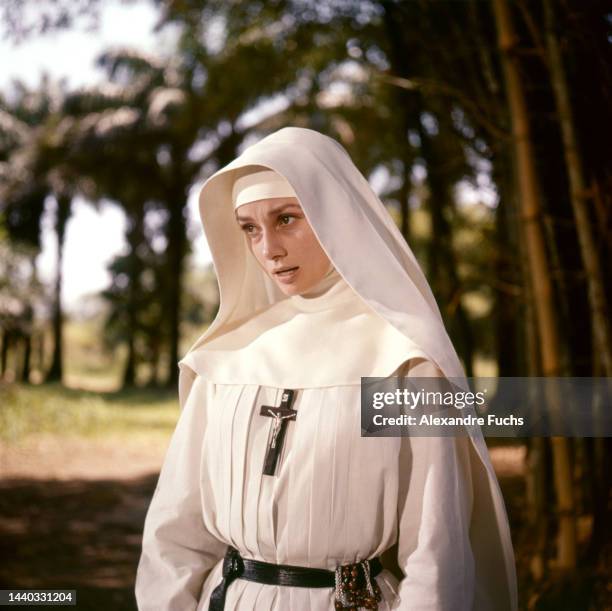 Audrey Hepburn photographed in Democratic Republic of Congo, during the filming of The Nun's Story, directed by Fred Zinnemann, dressed as a Nun in...