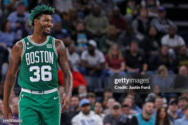 Marcus Smart of the Boston Celtics smiles during the game against the Memphis Grizzlies at FedExForum on November 07, 2022 in Memphis, Tennessee....