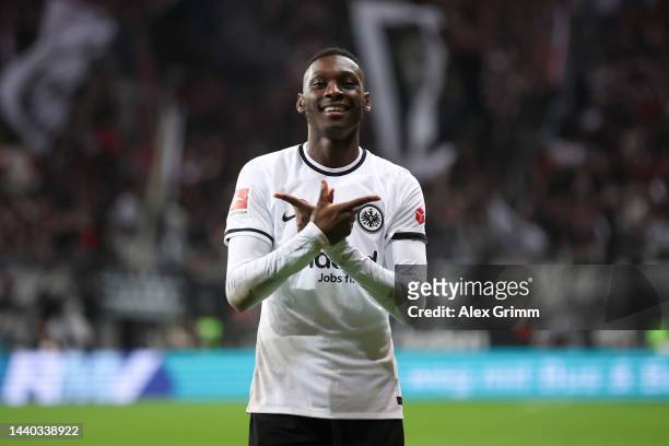 Randal Kolo Muani of Eintracht Frankfurt celebrates after scoring their sides second goal during the Bundesliga match between Eintracht Frankfurt and...