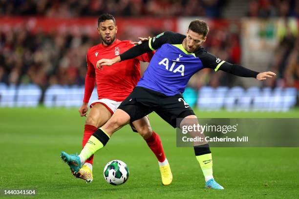 Renan Lodi of Nottingham Forest battles for possession with Matt Doherty of Tottenham Hotspur during the Carabao Cup Third Round match between...