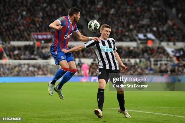 Joel Ward of Crystal Palace battles for possession with Matt Targett of Newcastle United during the Carabao Cup Third Round match between Newcastle...