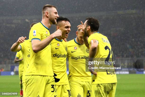 Lautaro Martinez of FC Internazionale celebrates with teammates after scoring their team's third goal during the Serie A match between FC...