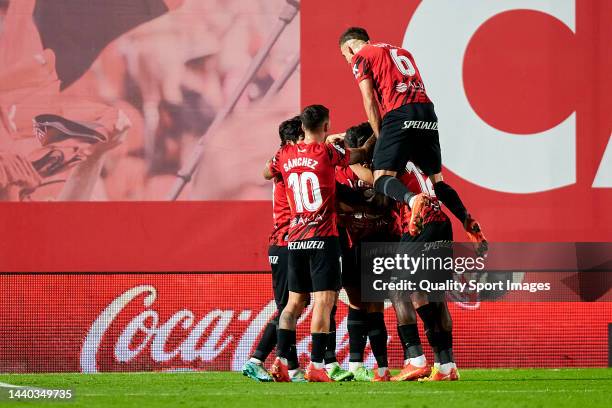 Vedat Muriqi of RCD Mallorca celebrates after scoring his team first goal during the LaLiga Santander match between RCD Mallorca and Atletico de...