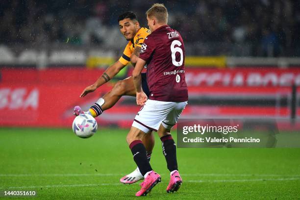 Daniele Montevago of UC Sampdoria is challenged by David Zima of Torino FC during the Serie A match between Torino FC and UC Sampdoria at Stadio...
