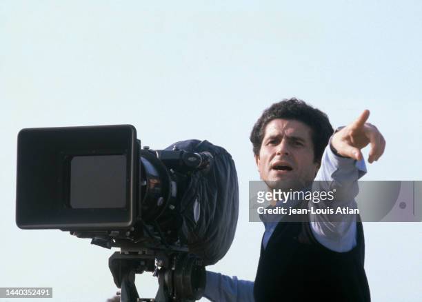 French director, screenwriter and producer Claude Lelouch on the set of his film “Les Uns et les autres”.
