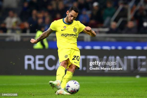 Hakan Calhanoglu of FC Internazionale scores their team's fifth goal from the penalty spot during the Serie A match between FC Internazionale and...