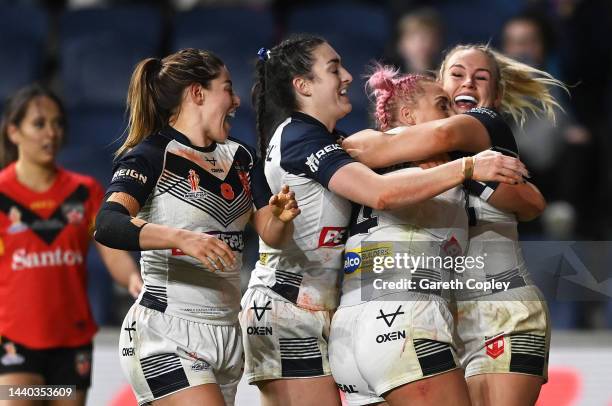 Amy Hardcastle of England celebrates their sides eighth try during the Women's Rugby League World Cup Group A match between England Women and Papua...