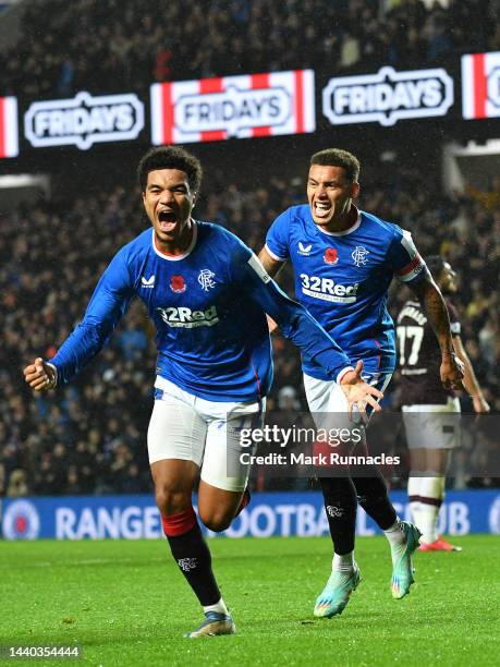 Malik Tillman of Rangers celebrates with James Taveriner of Rangers after scoring the opening goal of the game during the Cinch Scottish Premiership...