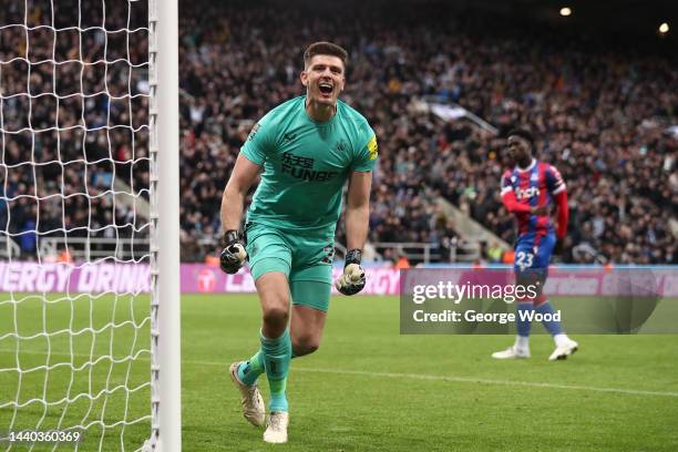 Nick Pope of Newcastle United celebrates their sides victory after saving a penalty taken by Malcolm Ebiowei of Crystal Palace during a penalty shoot...