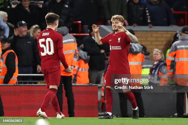 Harvey Elliott of Liverpool celebrates their sides victory with team mate Ben Doak after scoring their sides winning penalty during a penalty shoot...