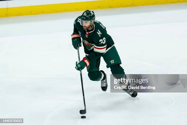Alex Goligoski of the Minnesota Wild skates with the puck against the New York Rangers in the second period of the game at Xcel Energy Center on...